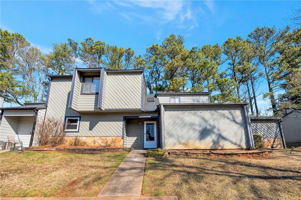 Undisclosed Address Marietta, GA 30064 - Photo 24 of 25 a view of a house with a patio
