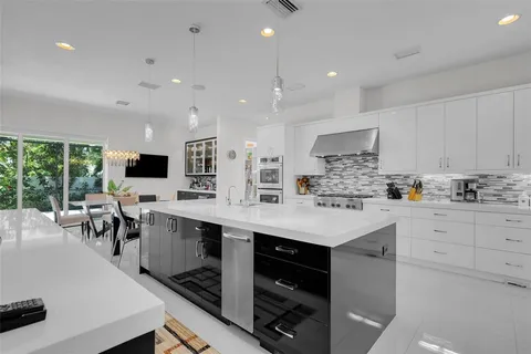 a bathroom with a double vanity sink mirror and double