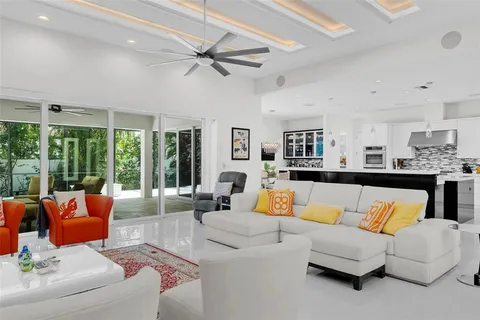 a kitchen with stainless steel appliances granite countertop a sink and cabinets