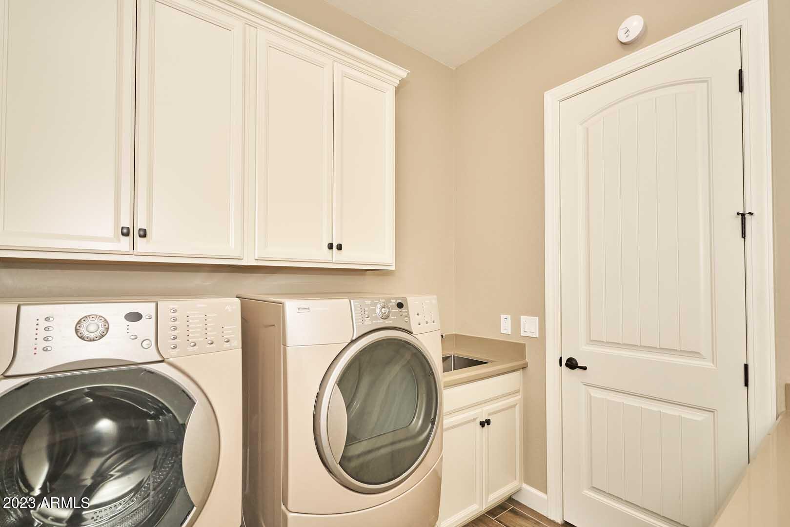 22308 East Maya Road Queen Creek, AZ 85142 - Photo 17 of 28 Laundry Room