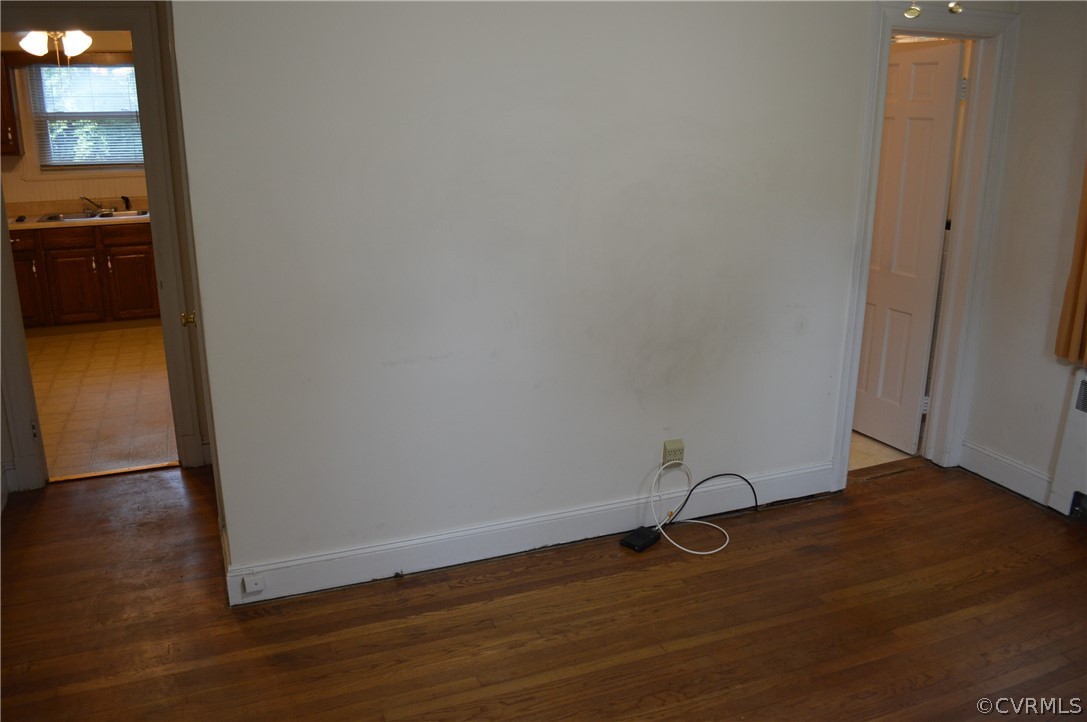 2825 Dumbarton Road Henrico, VA 23228 - Photo 24 of 50 1st floor front bedroom showing doors to kitchen a