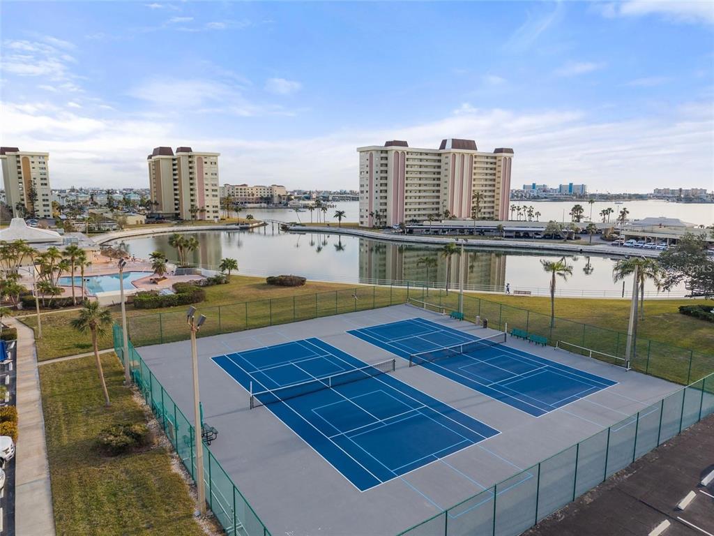 4775 Cove Circle, Unit 202 St. Petersburg, FL 33708 - Photo 14 of 19 a view of a city with tall buildings