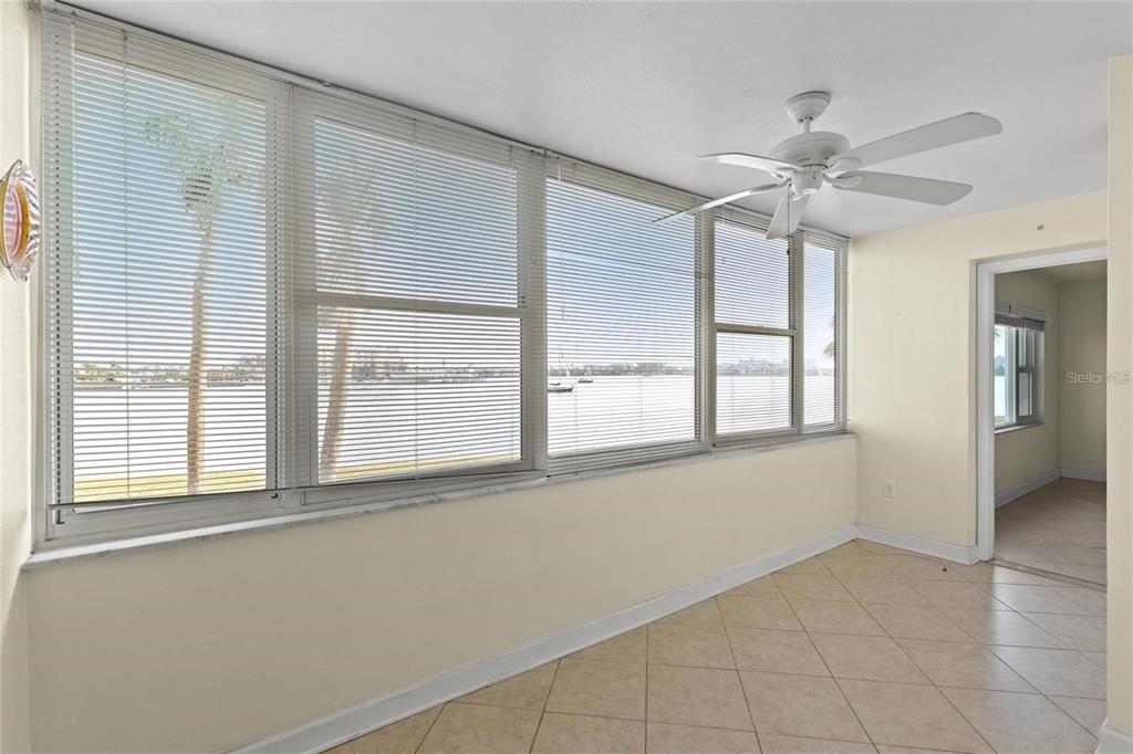 4775 Cove Circle, Unit 202 St. Petersburg, FL 33708 - Photo 8 of 19 a view of an empty room with a window