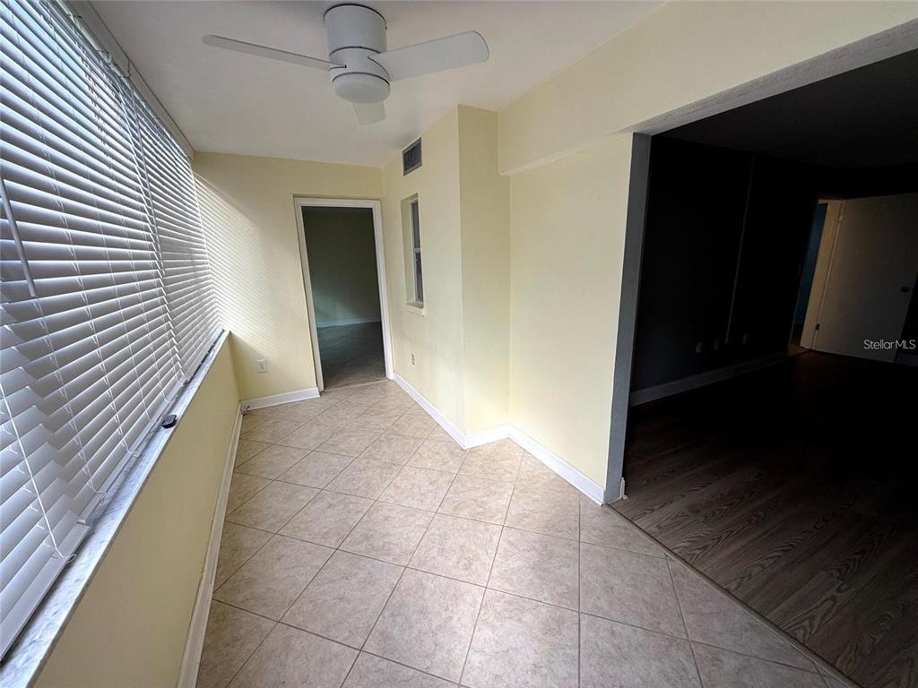 4775 Cove Circle, Unit 202 St. Petersburg, FL 33708 - Photo 9 of 19 a view of a hallway with entryway and closet