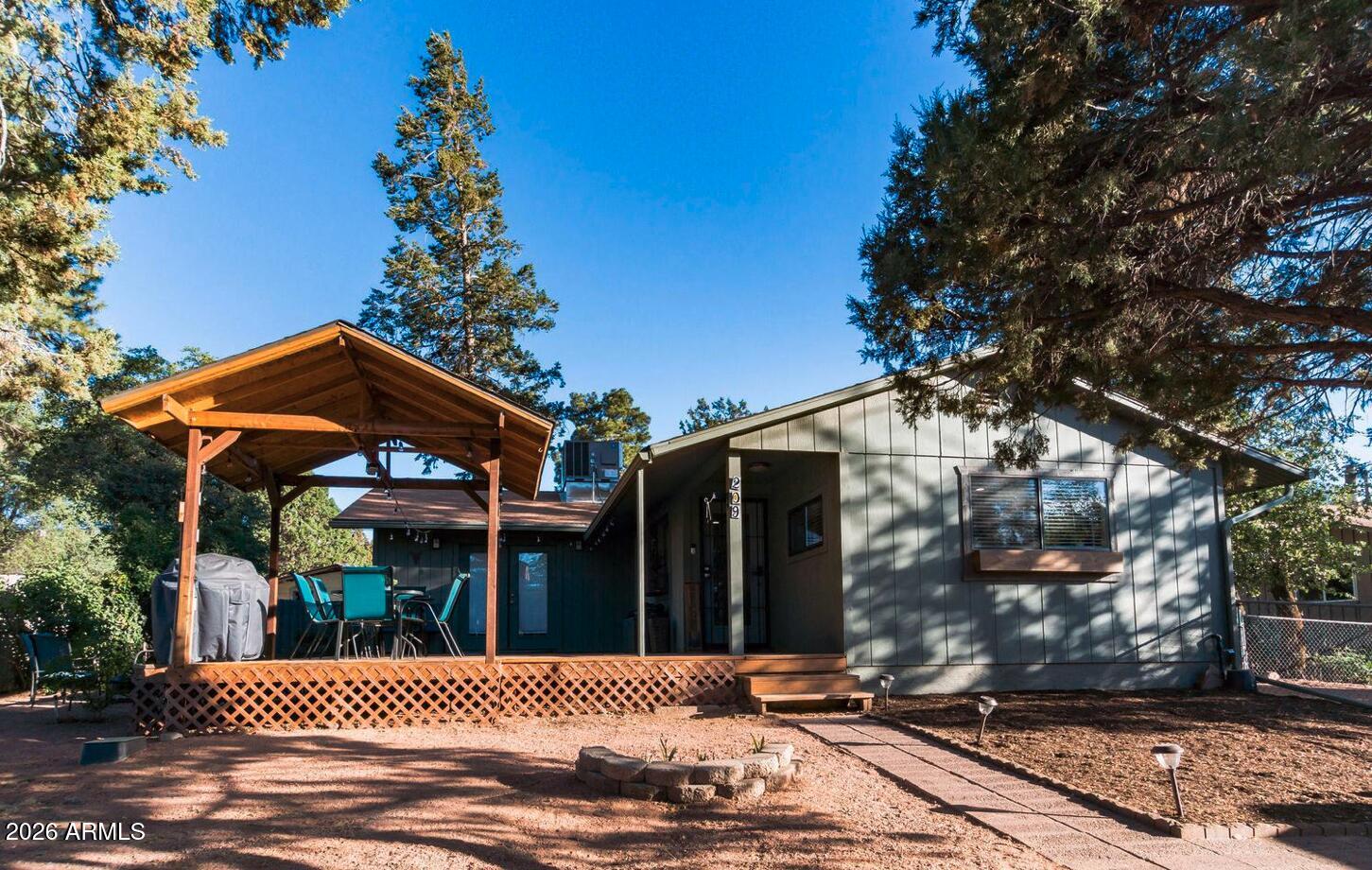 209 West Estate Lane Payson, AZ 85541 - Photo 1 of 12 a view of a house with a small yard