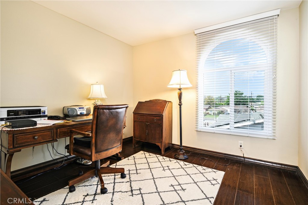 7267 Corbin Avenue, Unit M Winnetka, CA 91306 - Photo 15 of 28 a workspace with furniture and a window