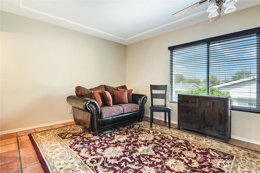 7267 Corbin Avenue, Unit M Winnetka, CA 91306 - Photo 7 of 28 a living room with furniture and a window