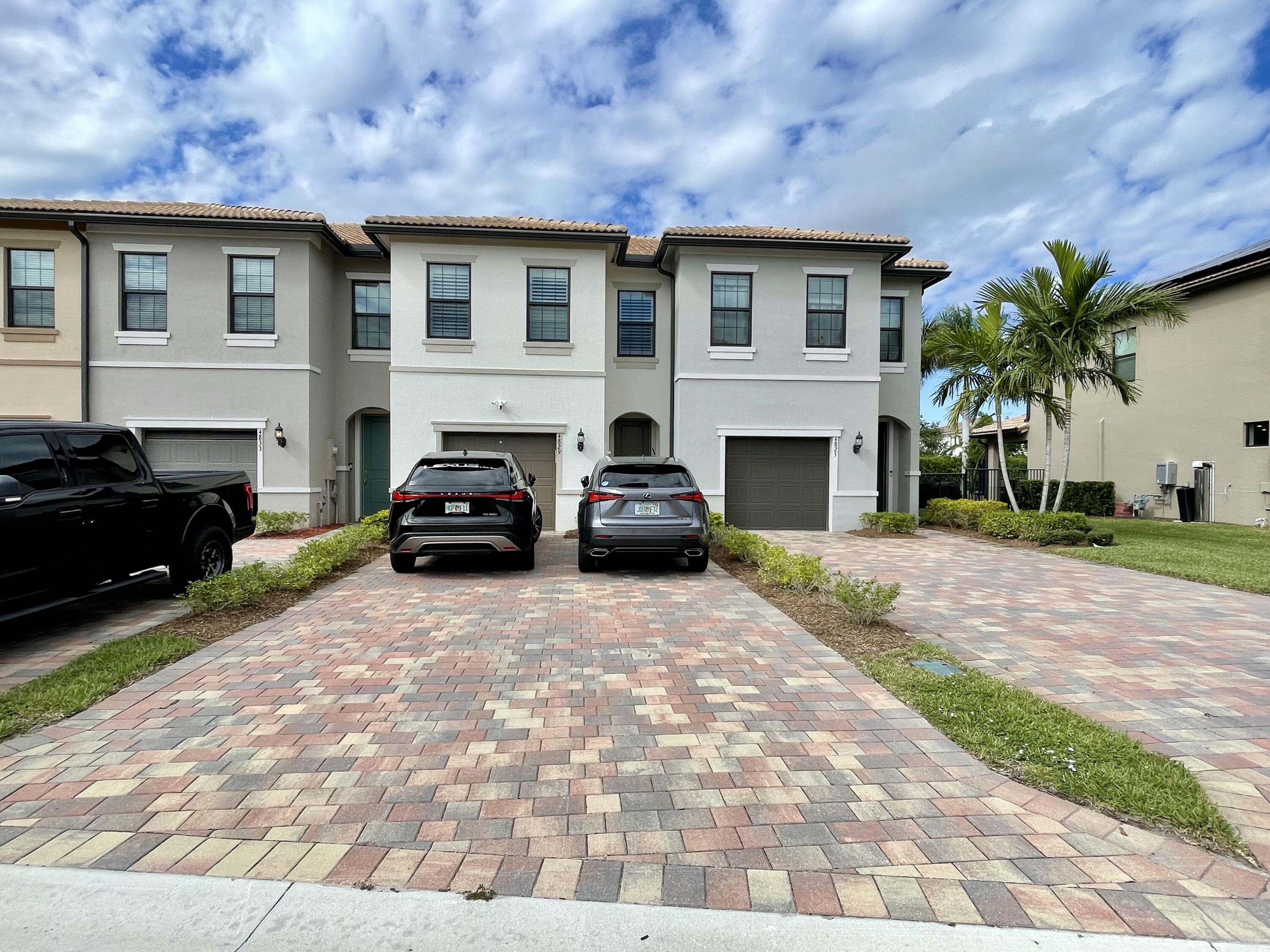 4829 Chantilly Road Lake Worth, FL 33467 - Photo 20 of 31 a house view with a garden space