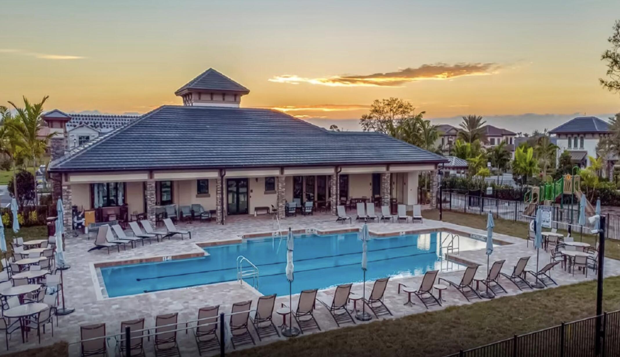 4829 Chantilly Road Lake Worth, FL 33467 - Photo 24 of 31 a front view of house with yard and seating area