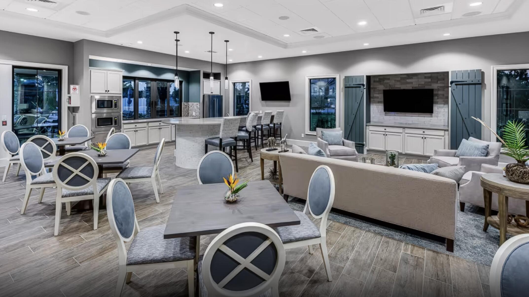 4829 Chantilly Road Lake Worth, FL 33467 - Photo 26 of 31 a dining room with wooden floor and windows