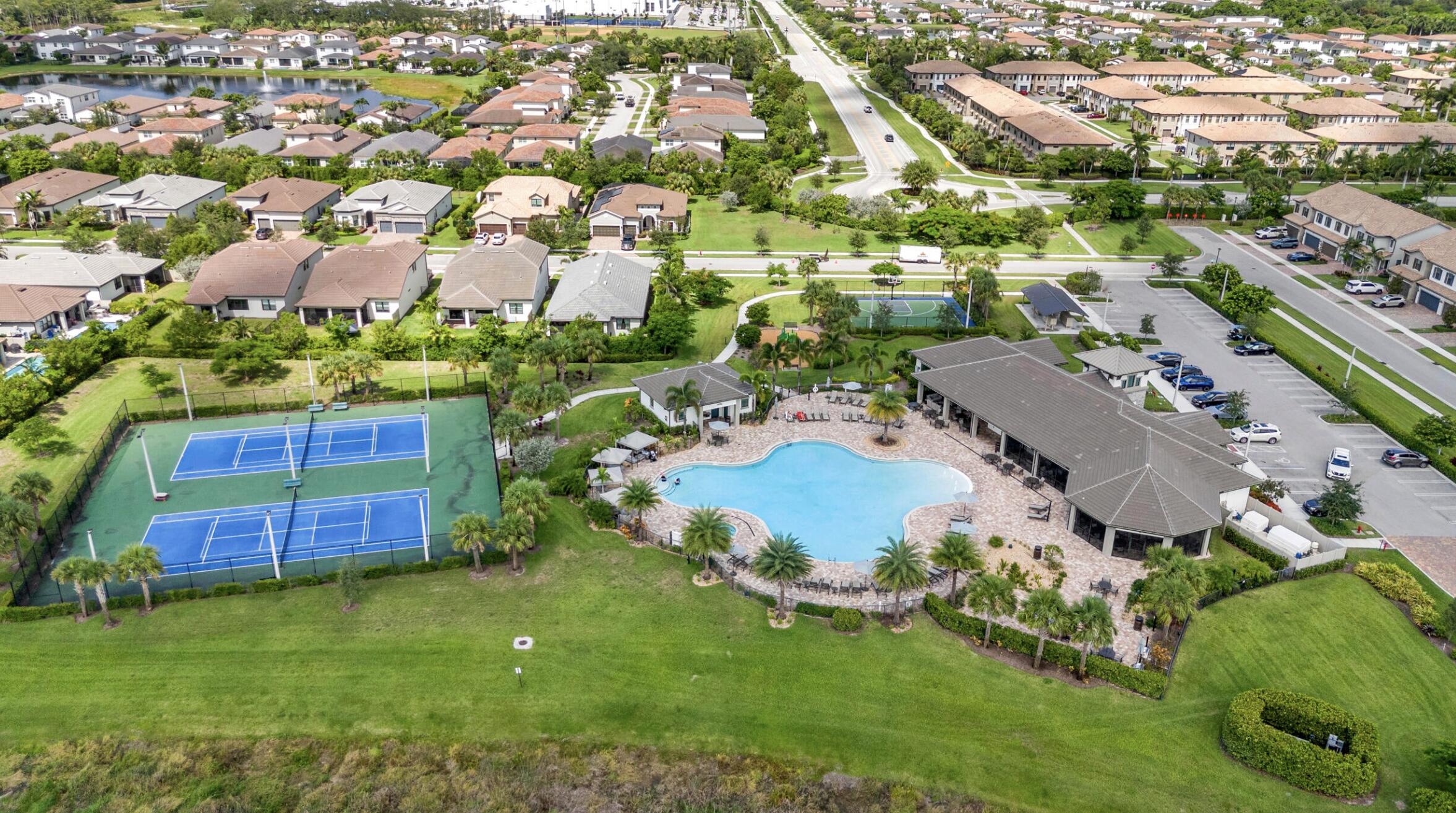 4829 Chantilly Road Lake Worth, FL 33467 - Photo 27 of 31 an aerial view of residential houses with outdoor space and street view