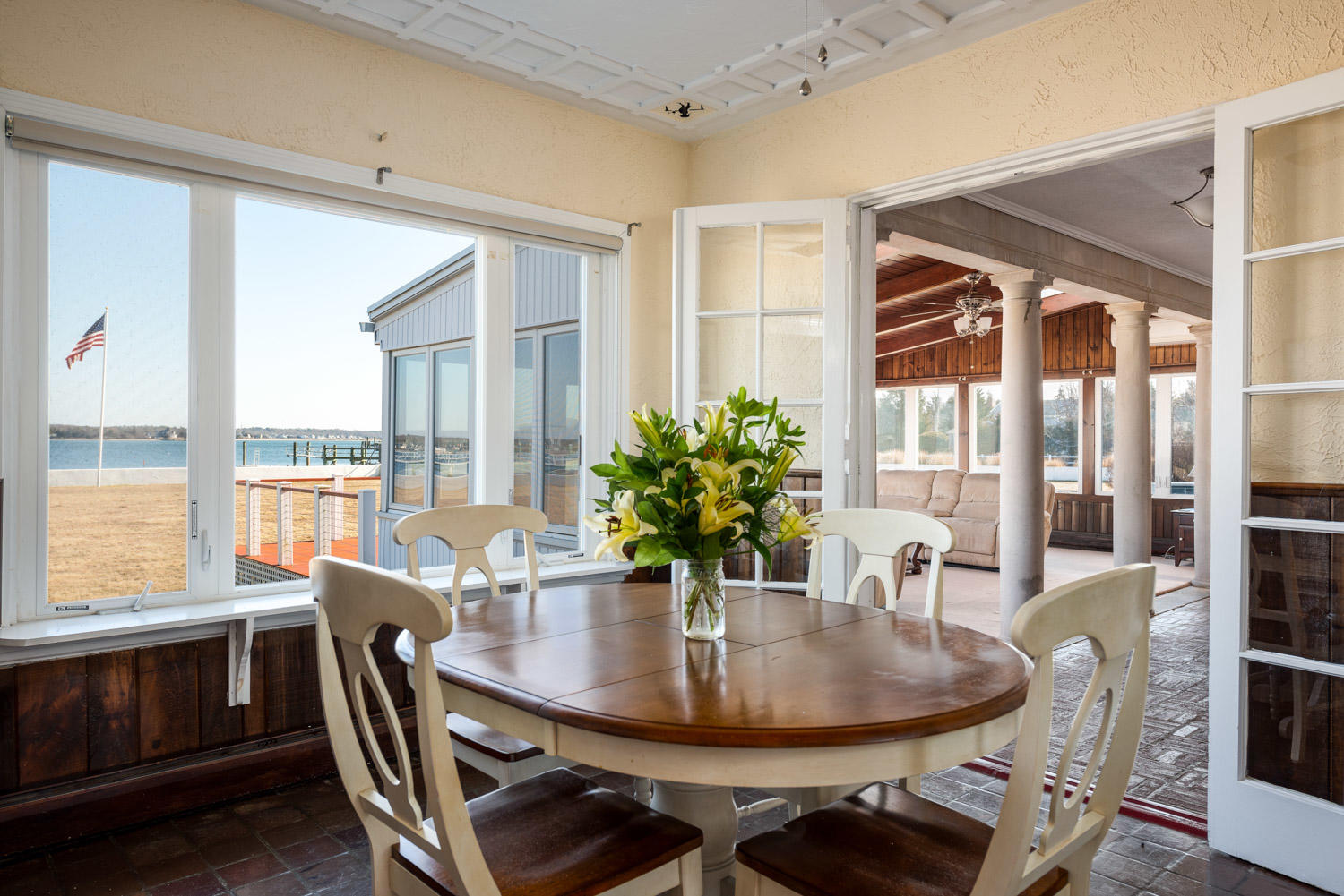 42 Robinwood Road Buzzards Bay, MA 02532 - Photo 16 of 39 a dining room with furniture window and wooden floor