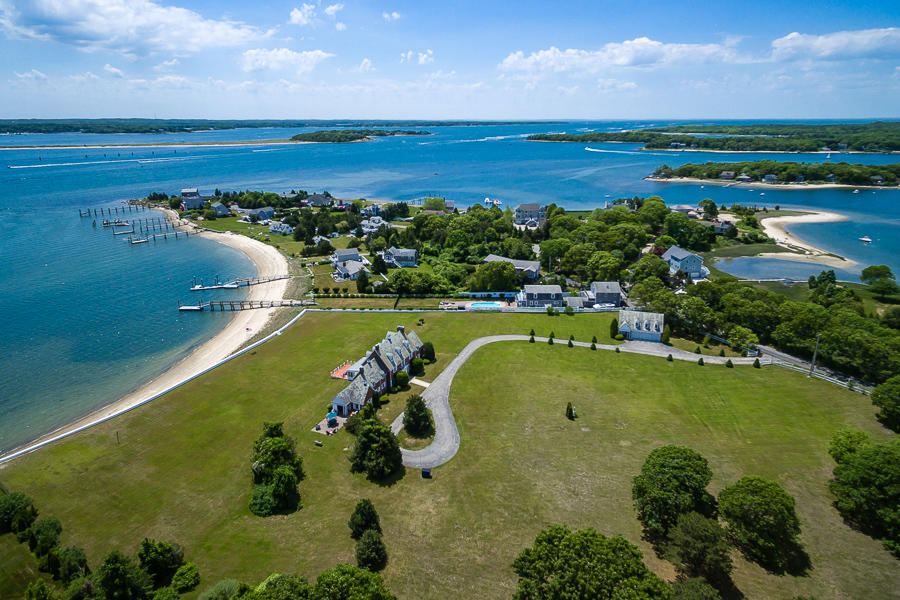 42 Robinwood Road Buzzards Bay, MA 02532 - Photo 31 of 39 a view of a lake with a yard