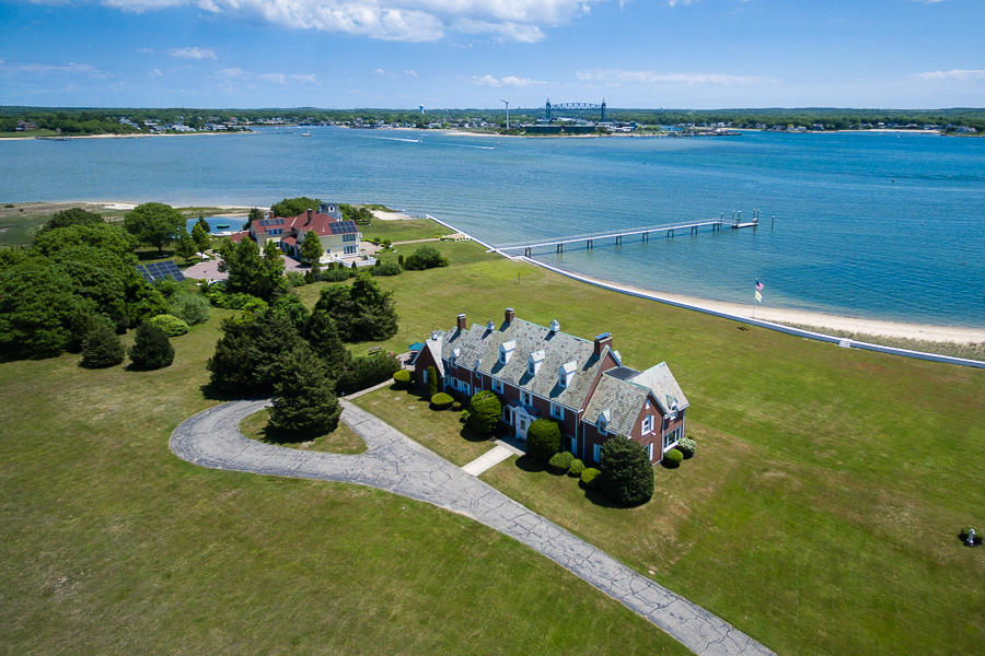 42 Robinwood Road Buzzards Bay, MA 02532 - Photo 38 of 39 an aerial view of a house with a garden and lake view