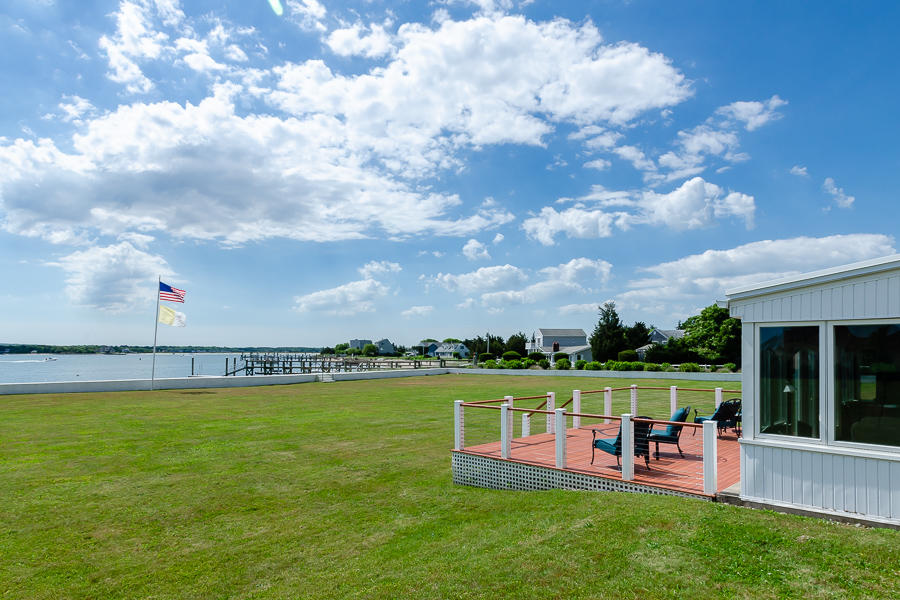 42 Robinwood Road Buzzards Bay, MA 02532 - Photo 10 of 39 a view of a lake with a garden and lake view