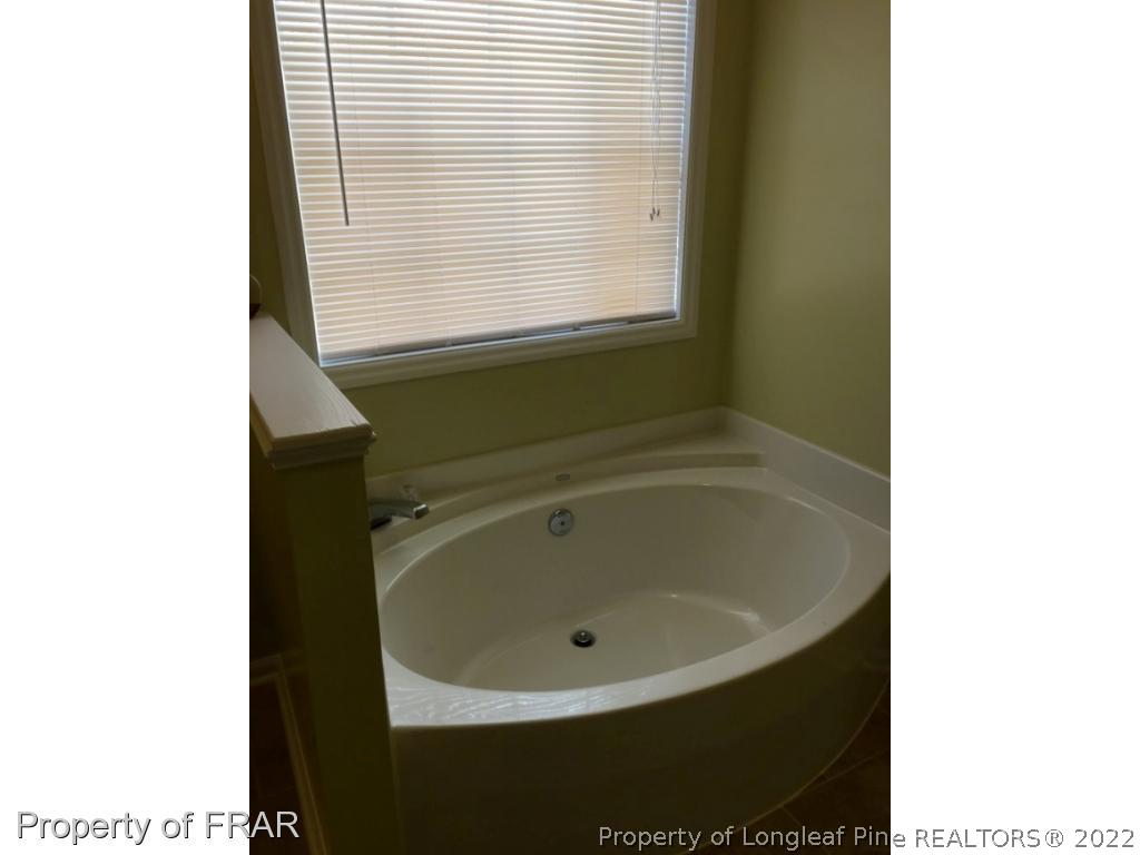 1065 Roundabout Road Cameron, NC 28326 - Photo 16 of 25 a bathroom with a sink