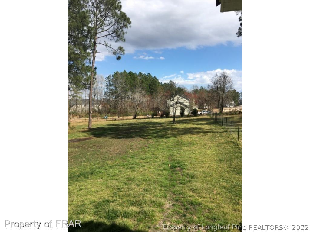 1065 Roundabout Road Cameron, NC 28326 - Photo 24 of 25 a view of residential houses with outdoor space