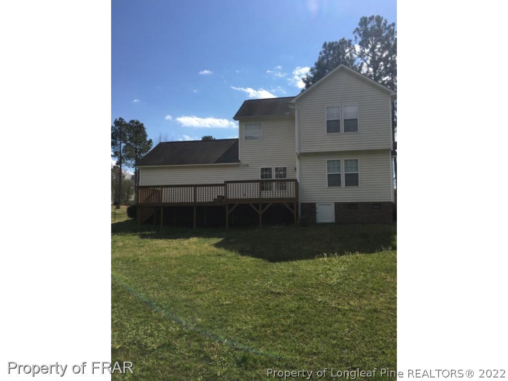 1065 Roundabout Road Cameron, NC 28326 - Photo 25 of 25 a view of a house with a yard