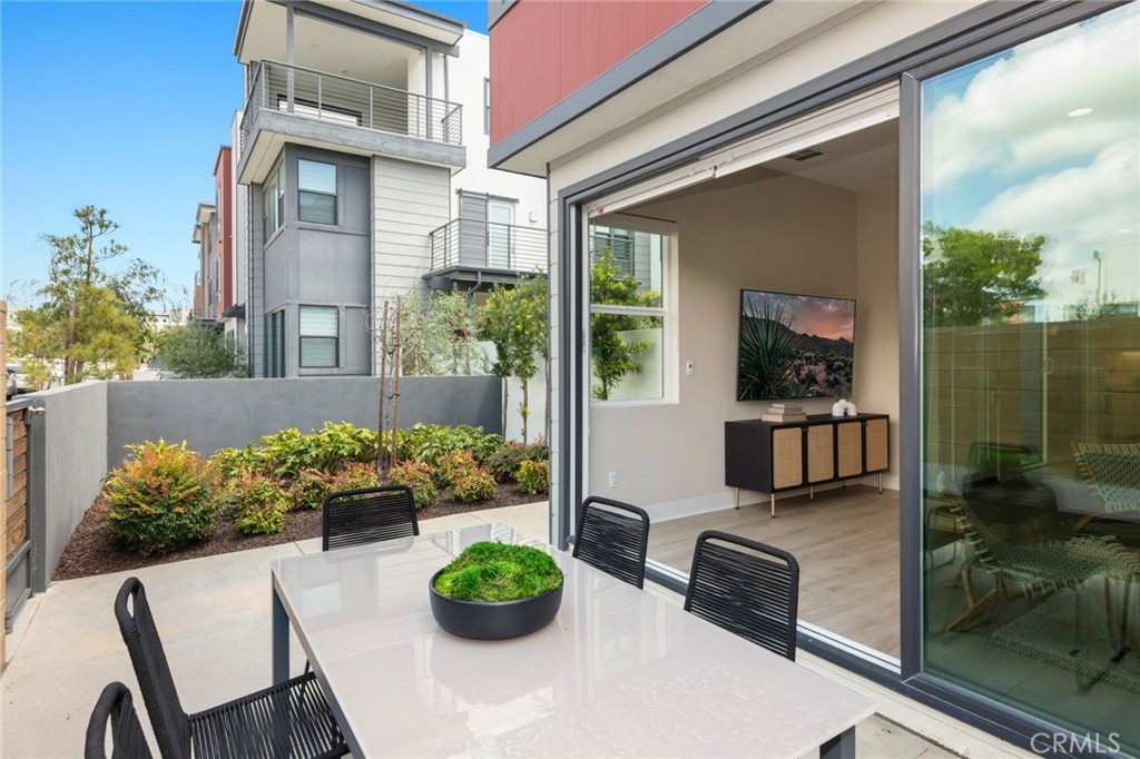 352 Novel Irvine, CA 92618 - Photo 20 of 75 a view of a chairs and table in a patio
