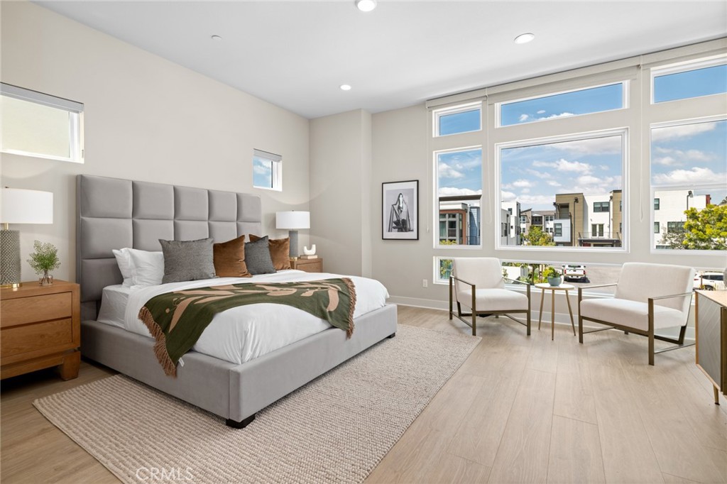 352 Novel Irvine, CA 92618 - Photo 23 of 75 a bed room with a bed and a chair