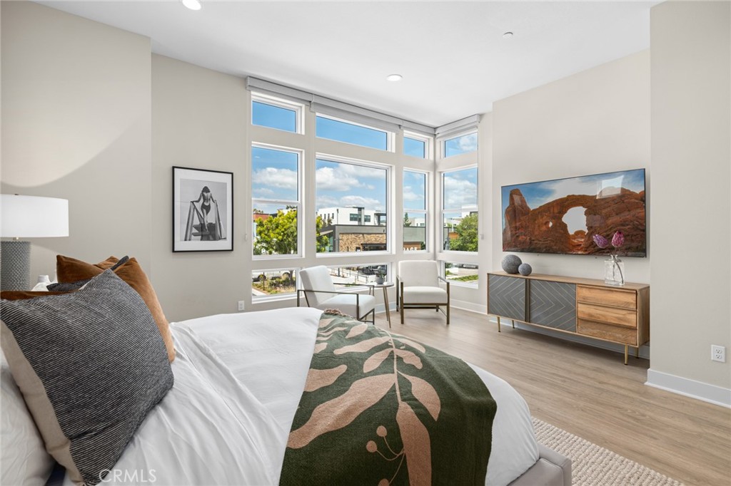 352 Novel Irvine, CA 92618 - Photo 24 of 75 a living room with furniture and a flat screen tv