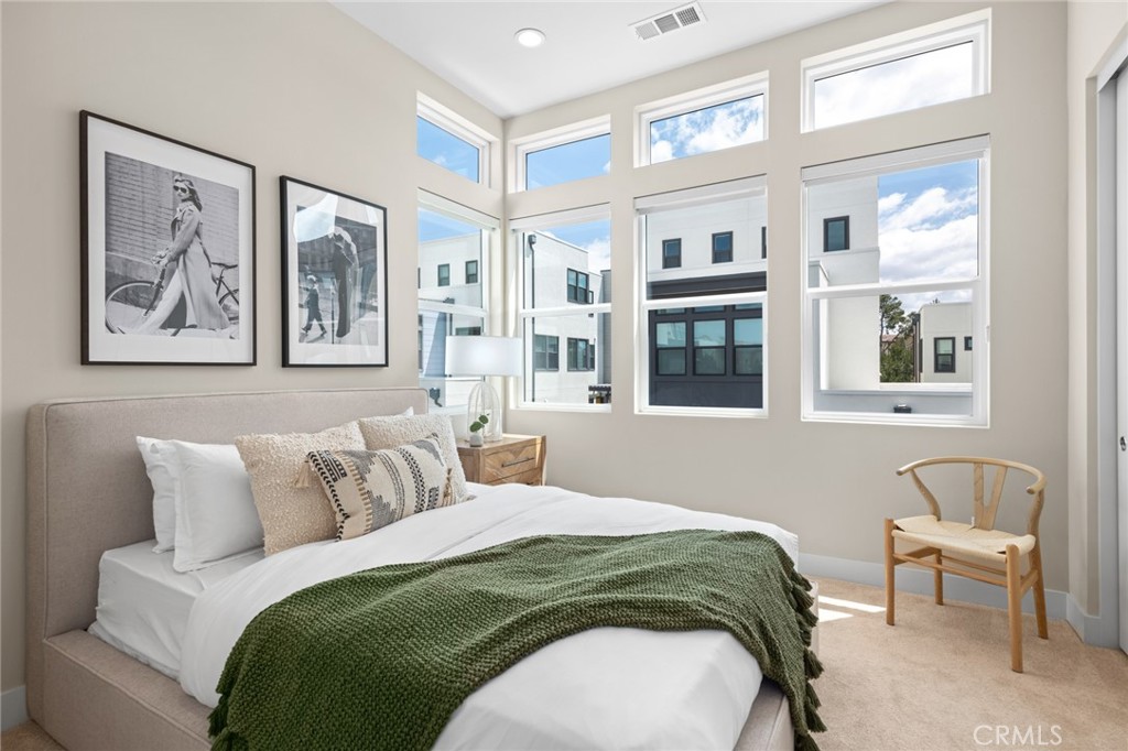 352 Novel Irvine, CA 92618 - Photo 27 of 75 a bedroom with a bed and a painting on the wall