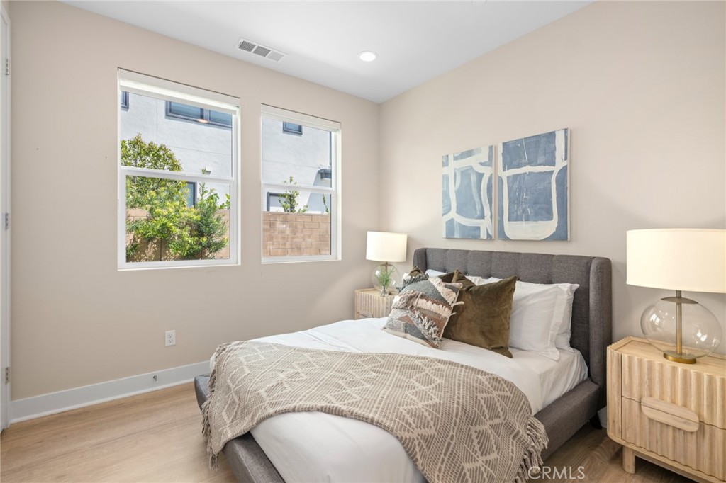 352 Novel Irvine, CA 92618 - Photo 29 of 75 a bedroom with a bed and a window