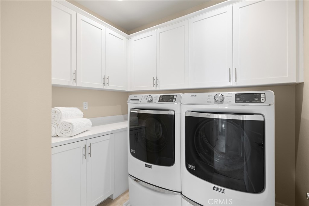 352 Novel Irvine, CA 92618 - Photo 31 of 75 a utility room with dryer and washer