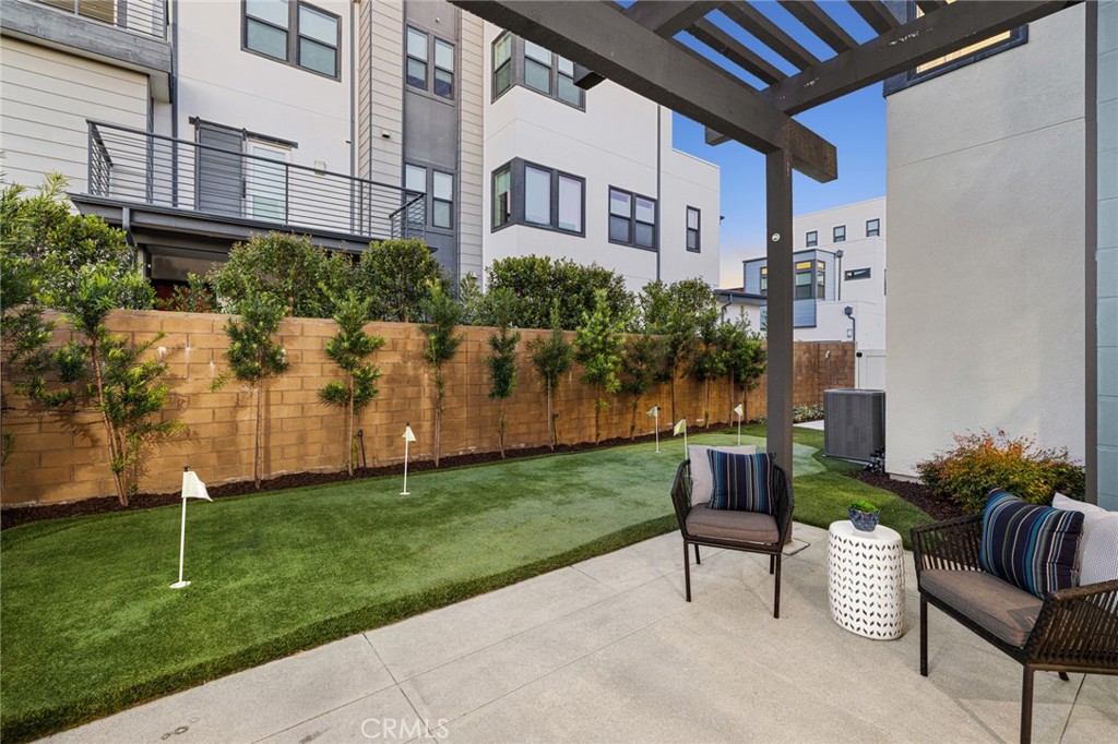 352 Novel Irvine, CA 92618 - Photo 4 of 75 a view of a patio with a table and a chairs
