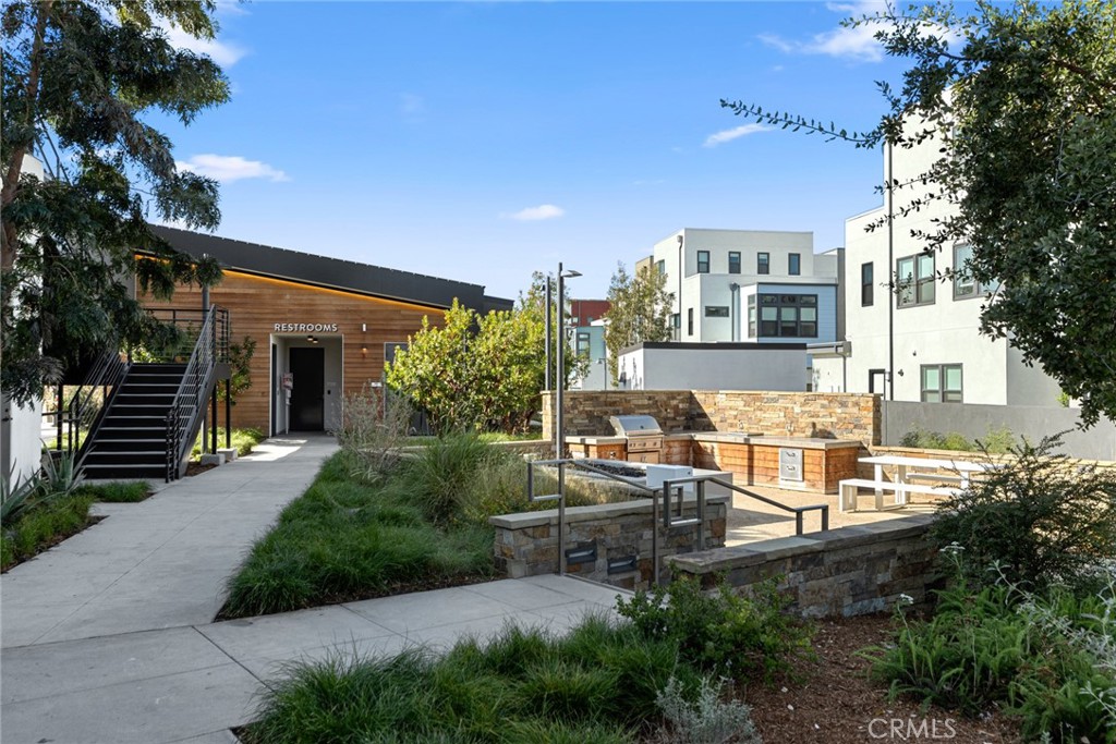 352 Novel Irvine, CA 92618 - Photo 49 of 75 a view of a patio with table and chairs and potted plants