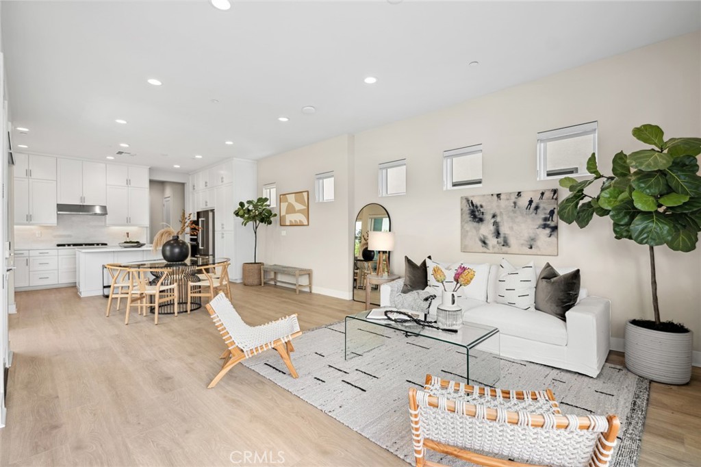 352 Novel Irvine, CA 92618 - Photo 8 of 75 a living room with furniture and a table