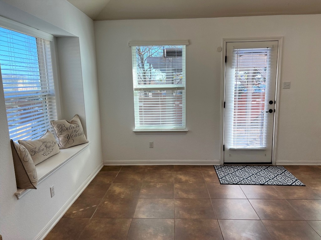 1711 Hidden Springs Path Round Rock, TX 78665 - Photo 14 of 39 a view of an empty room with a window