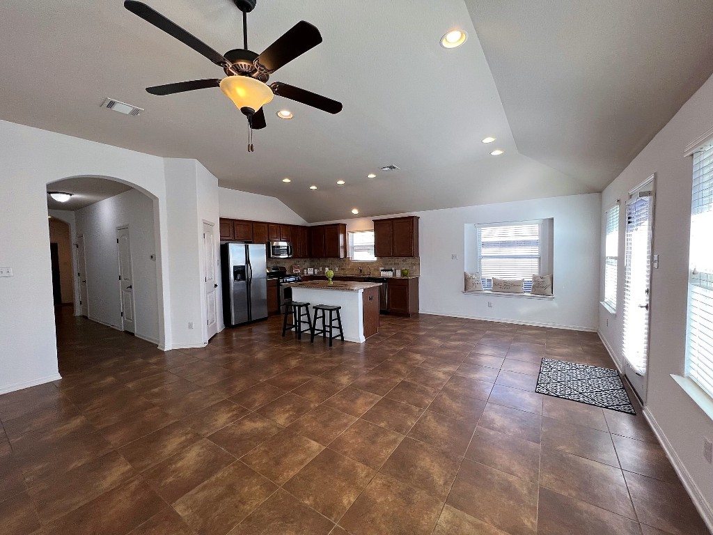 1711 Hidden Springs Path Round Rock, TX 78665 - Photo 15 of 39 a view of a room with kitchen and windows