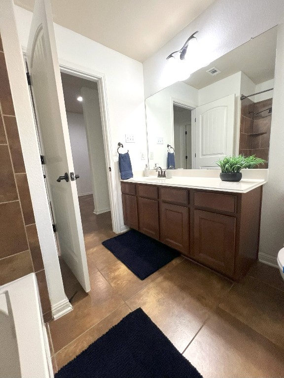 1711 Hidden Springs Path Round Rock, TX 78665 - Photo 23 of 39 a view of cabinets and chair in a room