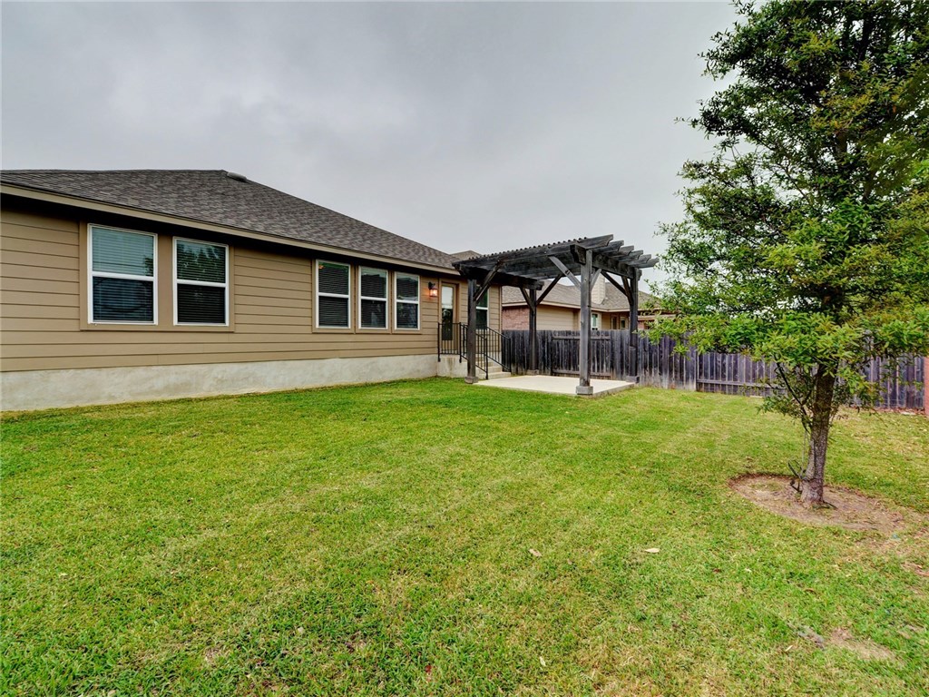 1711 Hidden Springs Path Round Rock, TX 78665 - Photo 30 of 39 a house view with a garden space