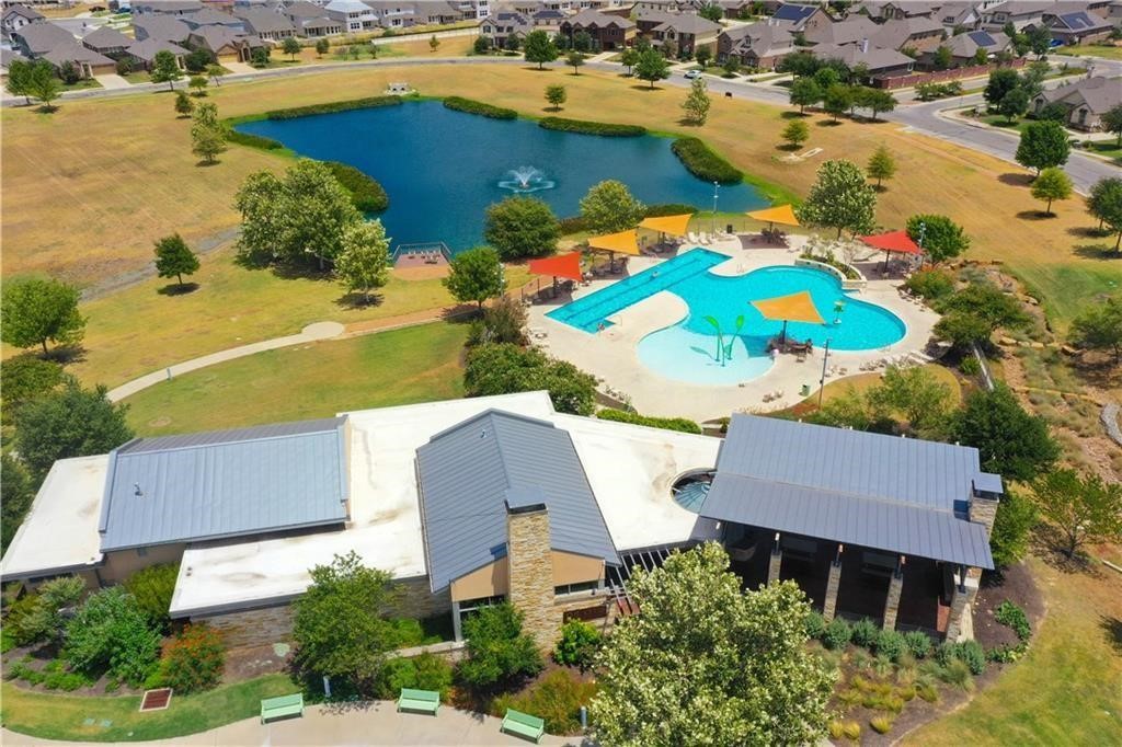 1711 Hidden Springs Path Round Rock, TX 78665 - Photo 33 of 39 an aerial view of a house with a lake view