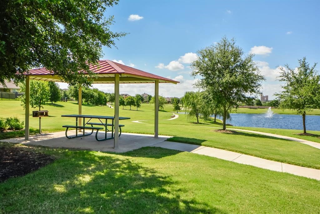 1711 Hidden Springs Path Round Rock, TX 78665 - Photo 36 of 39 a view of a house with a backyard porch and sitting area