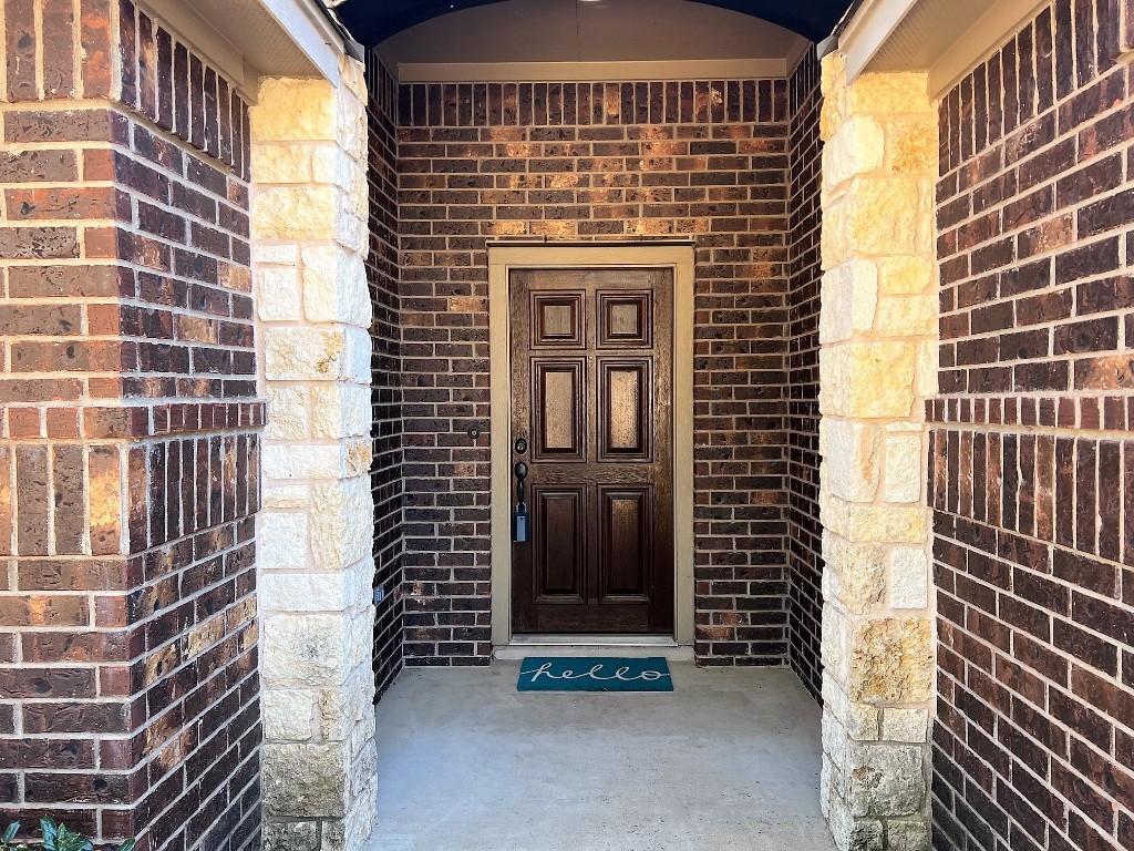 1711 Hidden Springs Path Round Rock, TX 78665 - Photo 4 of 39 a front view of a building