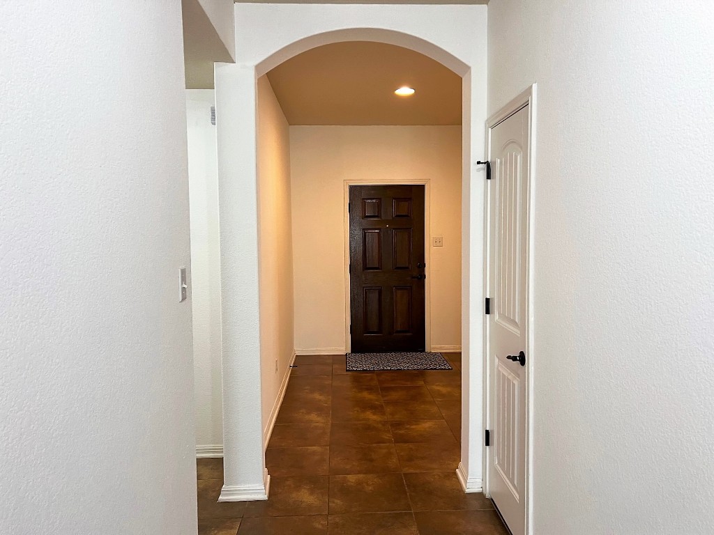 1711 Hidden Springs Path Round Rock, TX 78665 - Photo 5 of 39 a view of livingroom with hallway