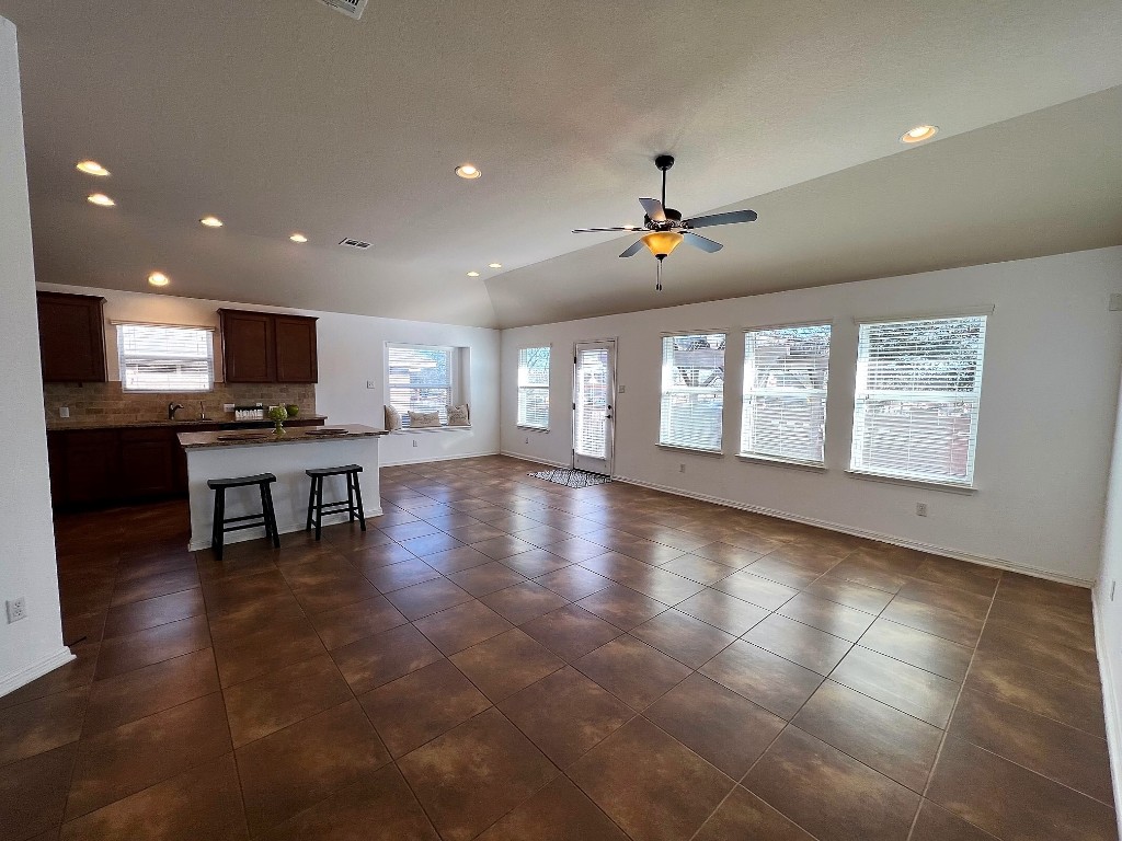 1711 Hidden Springs Path Round Rock, TX 78665 - Photo 39 of 39 a view of an empty room with kitchen and window