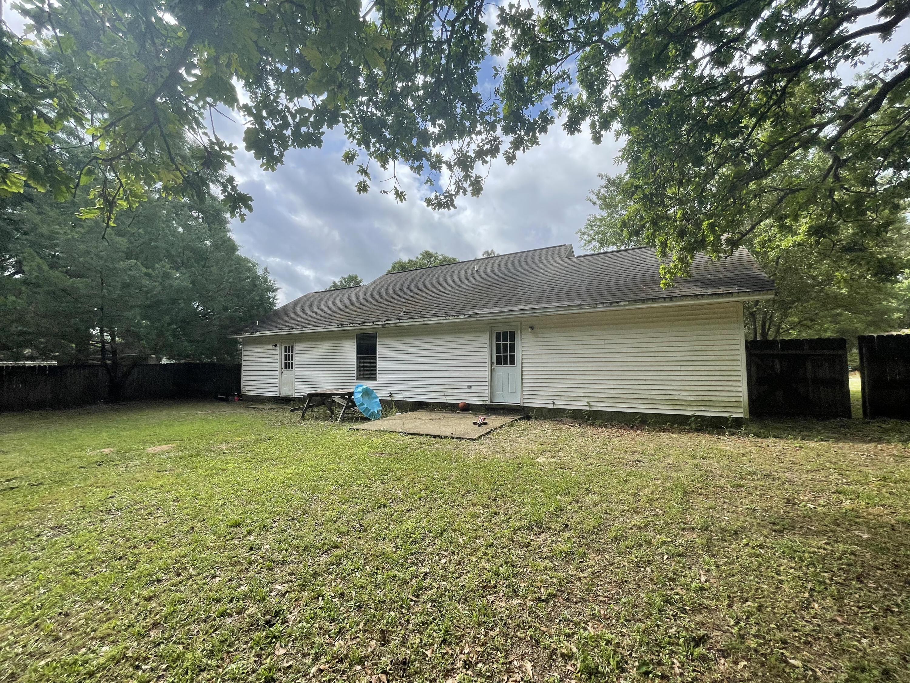 116 Springwood Circle Crestview, FL 32536 - Photo 14 of 14 a house with a yard