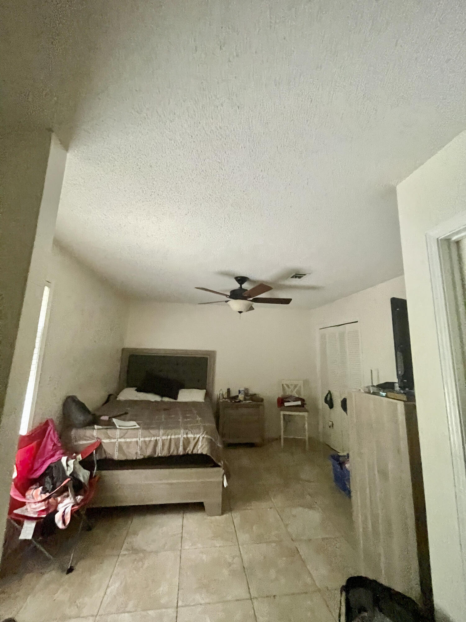 116 Springwood Circle Crestview, FL 32536 - Photo 9 of 14 a bedroom with a bed and a window