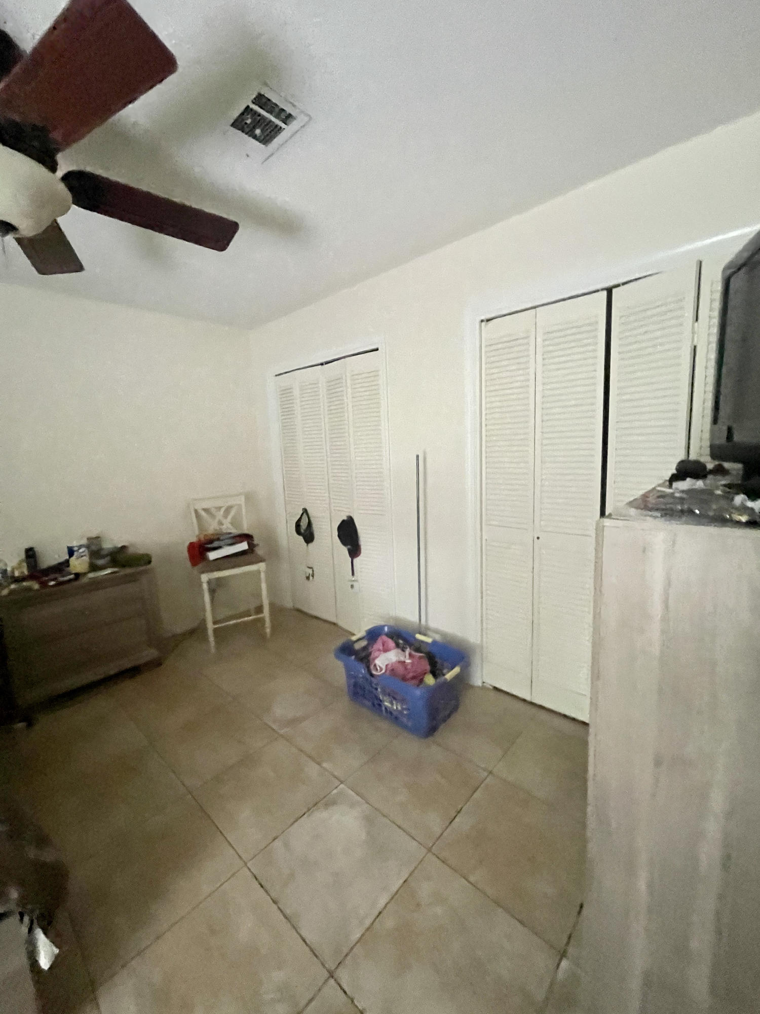 116 Springwood Circle Crestview, FL 32536 - Photo 10 of 14 a living room with furniture and a flat screen tv