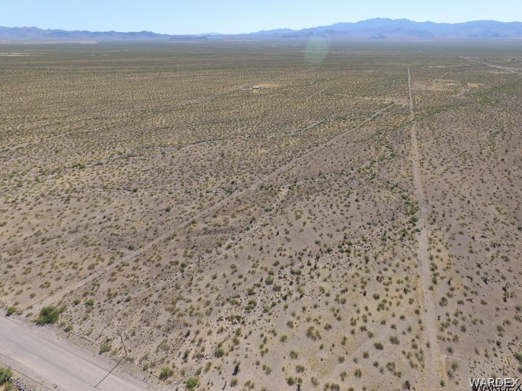 5870 Muscovite Road Golden Valley, AZ 86413 - Photo 14 of 21 a view of an ocean beach and mountain