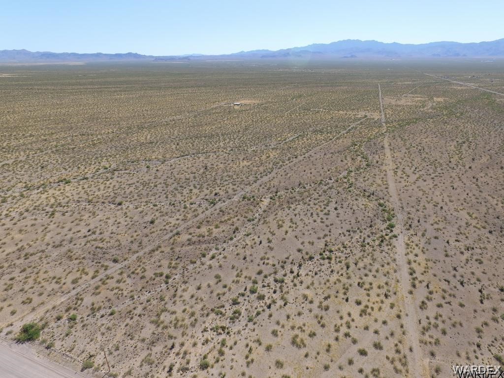 5870 Muscovite Road Golden Valley, AZ 86413 - Photo 15 of 21 a view of an ocean and a mountain