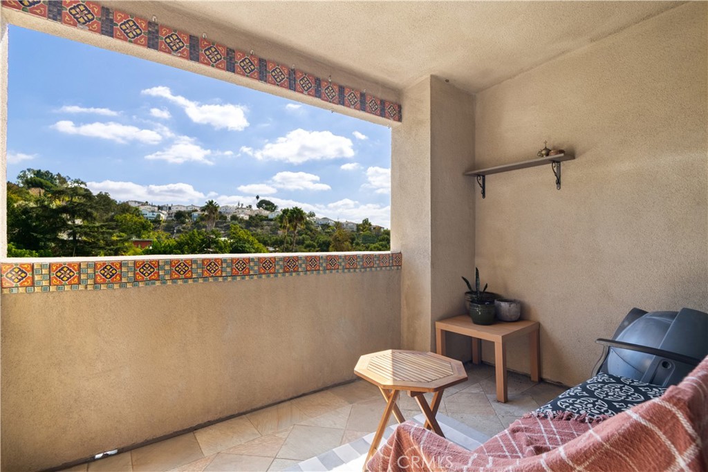6221 Monterey Road, Unit 304 Highland Park, CA 90042 - Photo 20 of 33 a view of a balcony with chairs