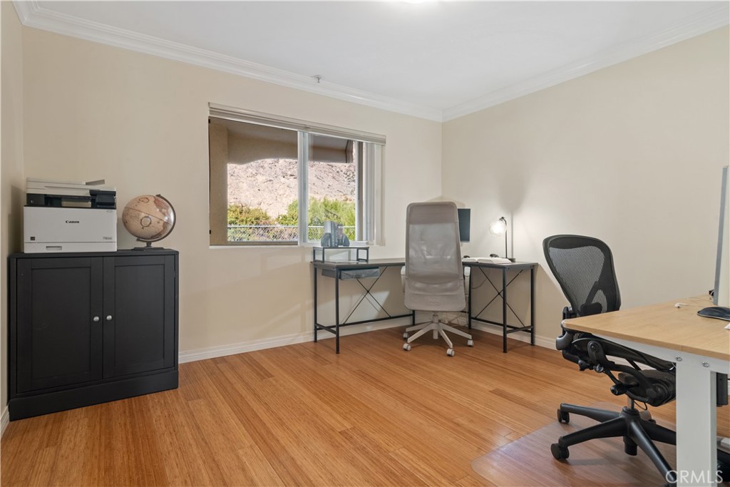 6221 Monterey Road, Unit 304 Highland Park, CA 90042 - Photo 21 of 33 a view of a workspace with furniture and a window