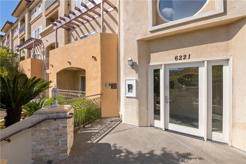6221 Monterey Road, Unit 304 Highland Park, CA 90042 - Photo 32 of 33 a front view of a building with entryway