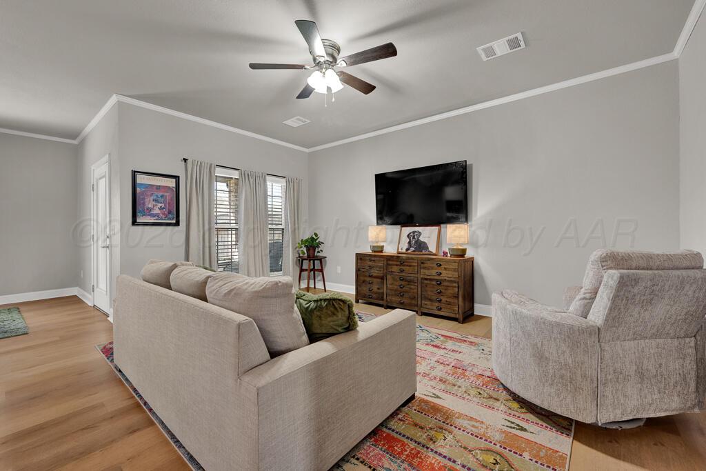9917 Addelyn Avenue Amarillo, TX 79119 - Photo 6 of 27 living room 1