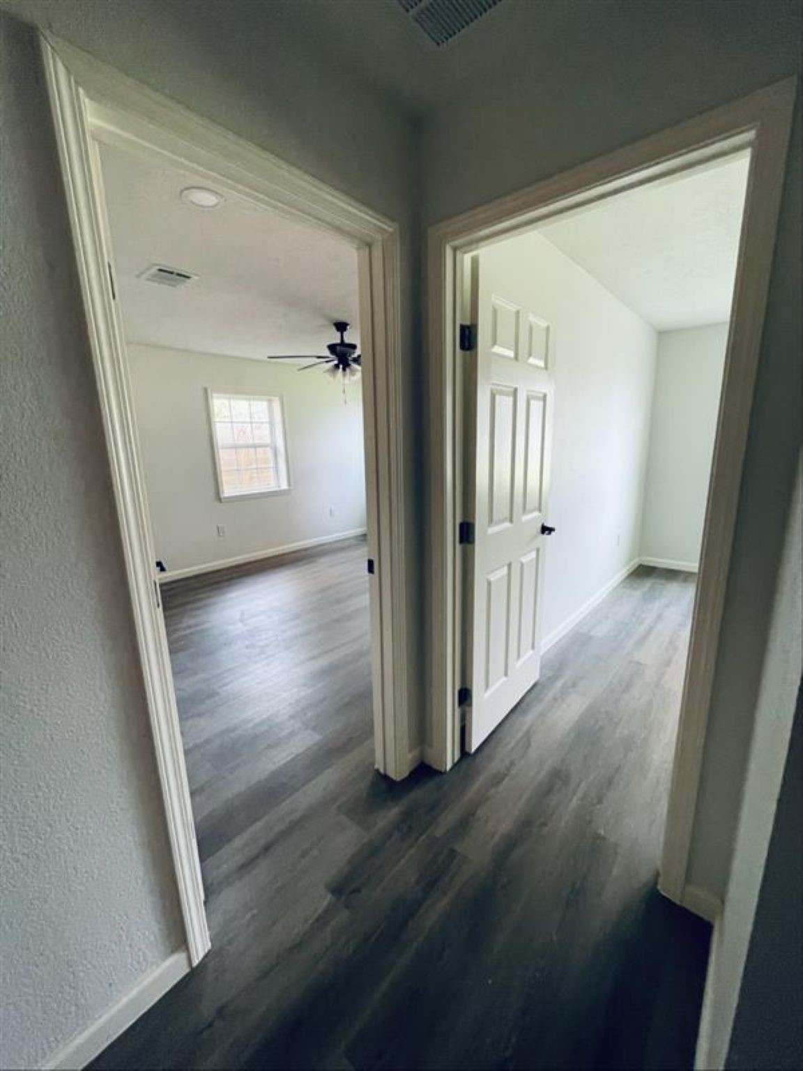 8817 Dandy Street Houston, TX 77016 - Photo 7 of 24 Hallway view of Primary and second bedroom